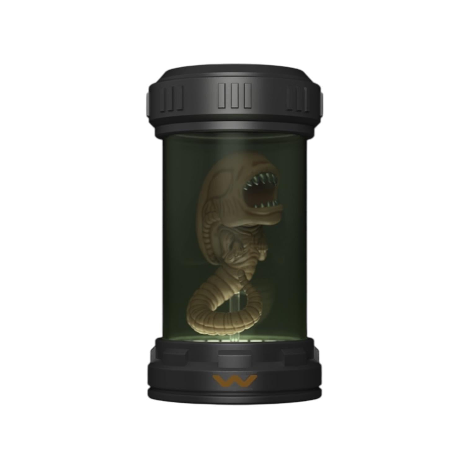 Toy dinosaur in a transparent cylindrical container with a black lid on a white background