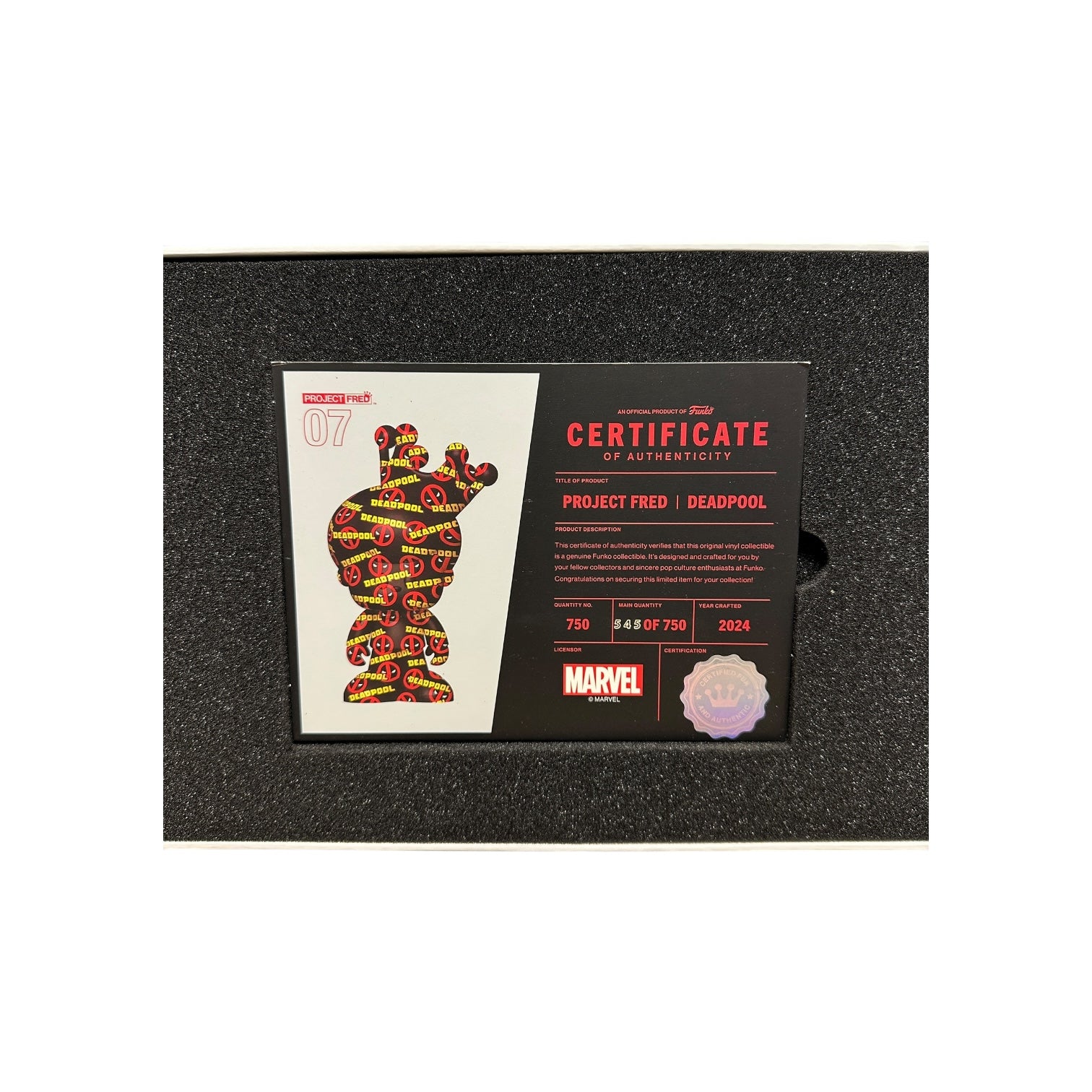 Marvel Deadpool figurine with certificate of authenticity in a black display box
