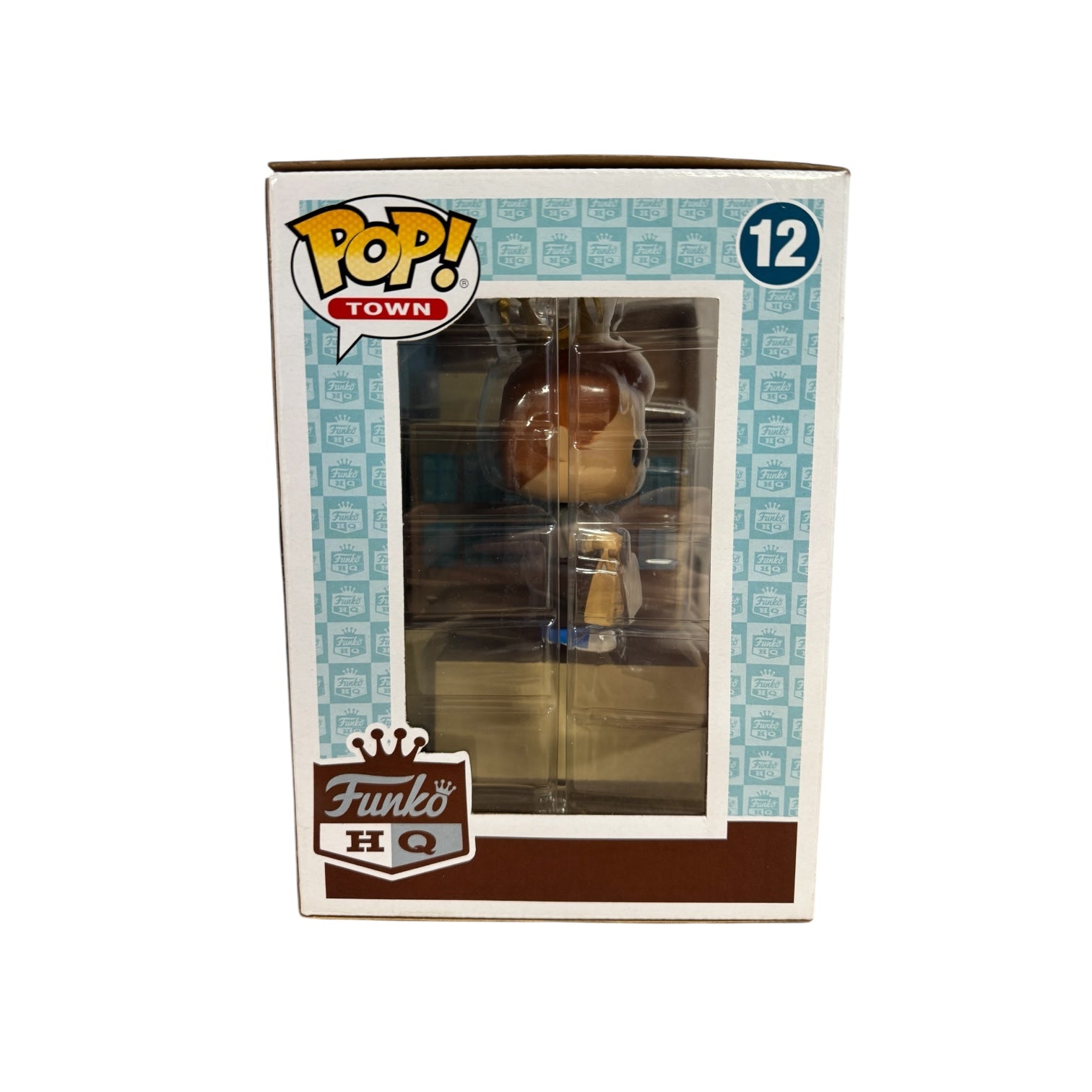 Freddy Funko with shopping bags standing next to Funko HQ building