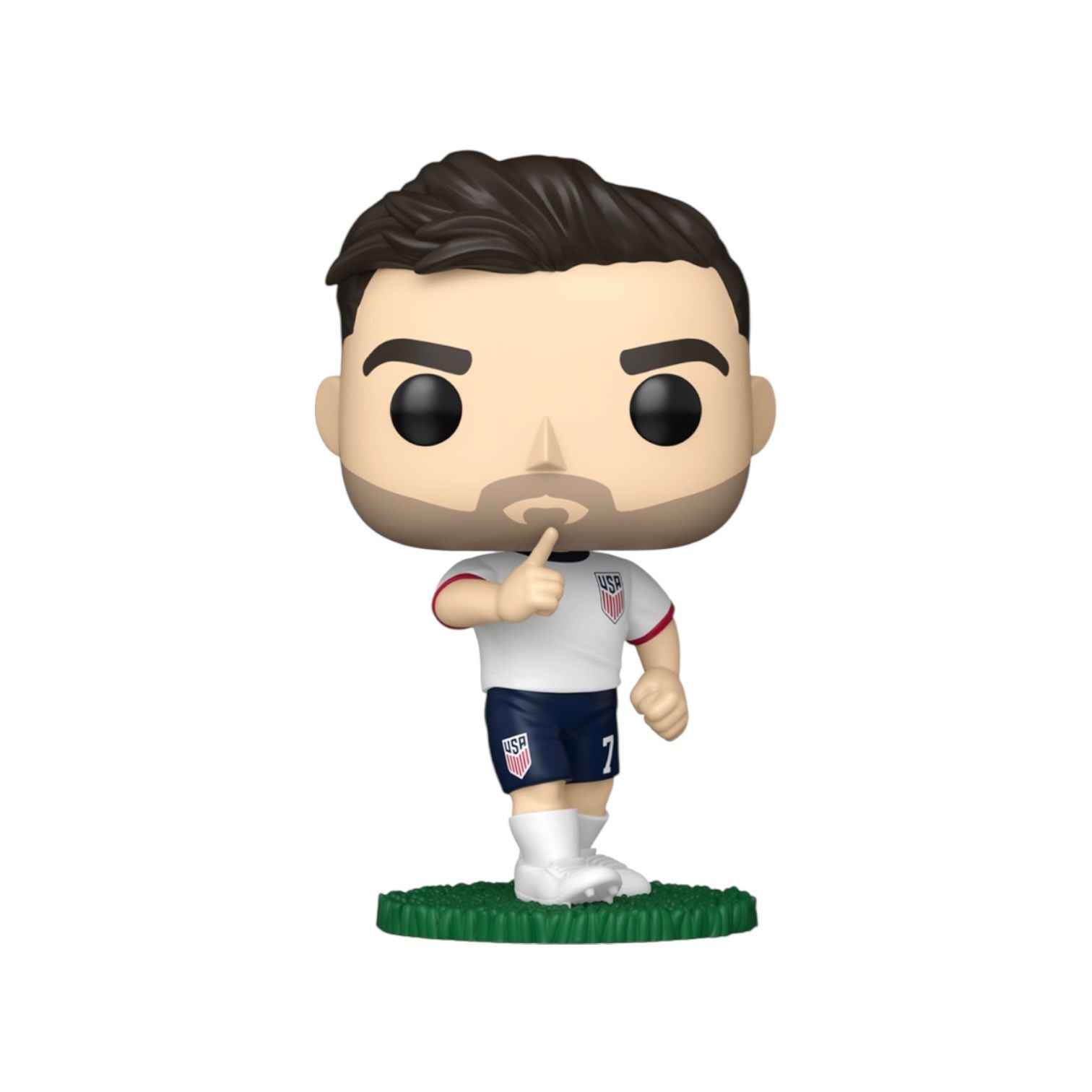 Figurine of a soccer player in a white jersey with blue shorts on a white background