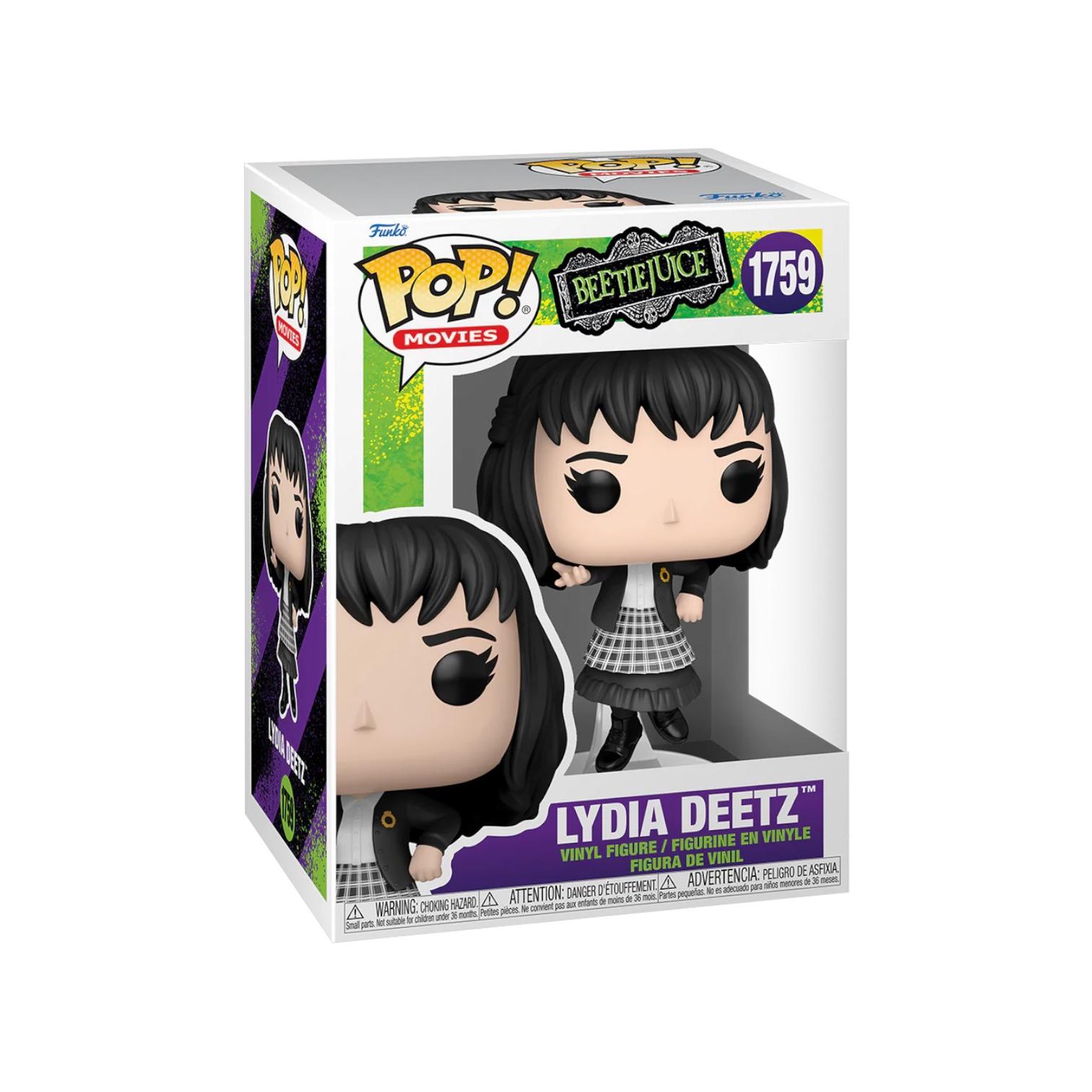 Lydia Deetz Floating in her traditional black and white checked skirt with white blouse and black jacket