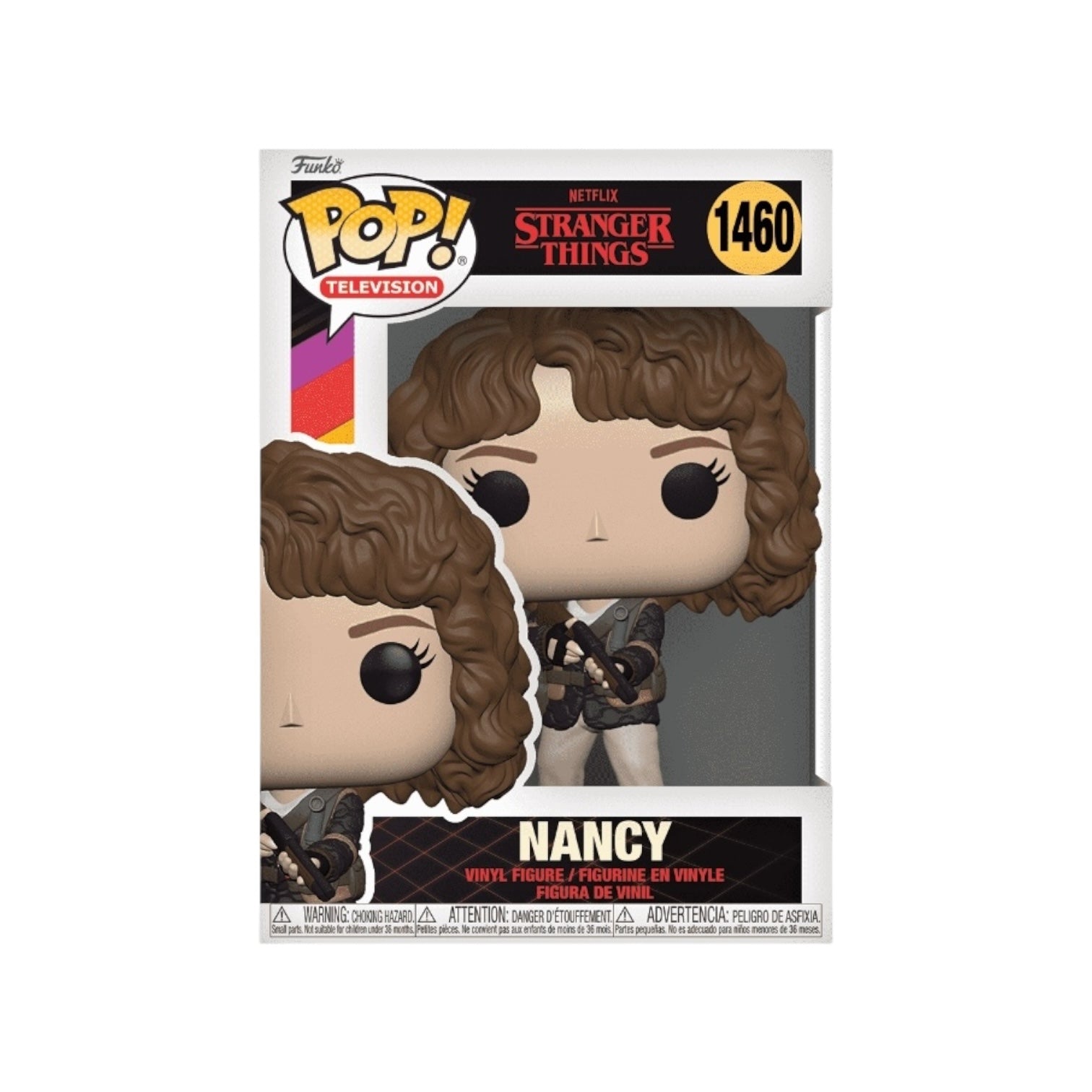 Nancy where a leather look black jacket with cream trouser, holding a gun