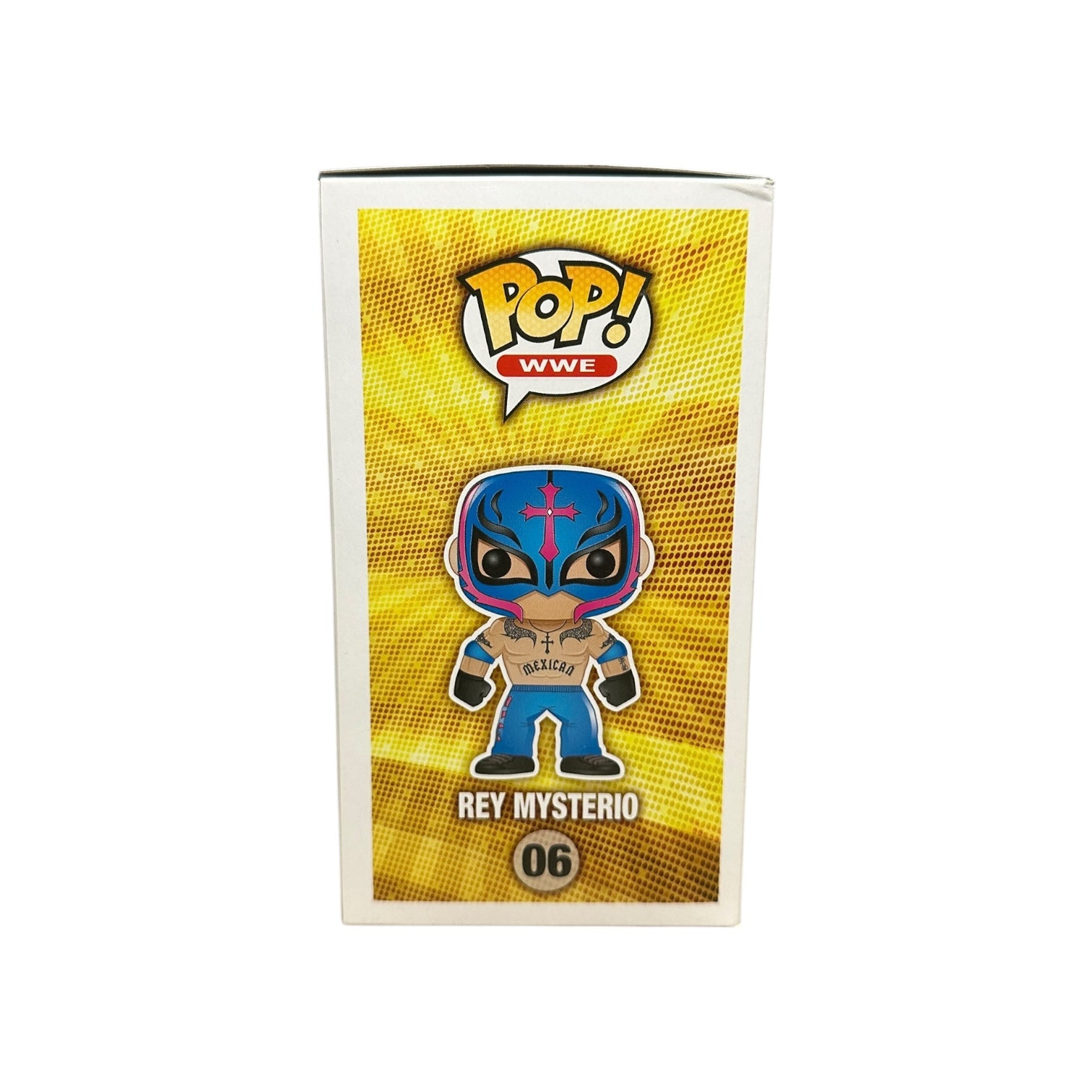 Funko Pop! vinyl figure packaging featuring Rey Mysterio on a yellow background