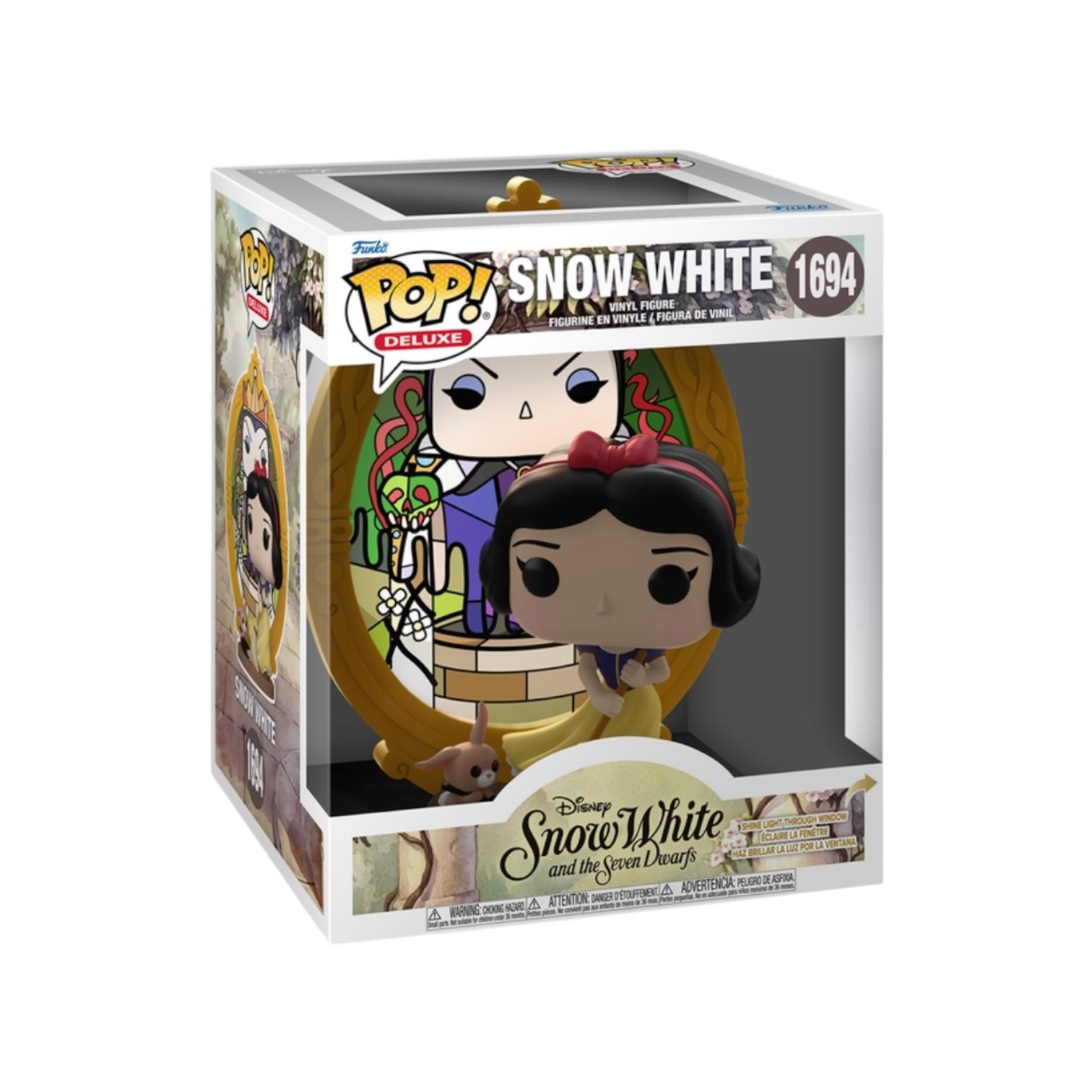 Funko Pop! Snow White figure in packaging with Stained Glass Mansion background