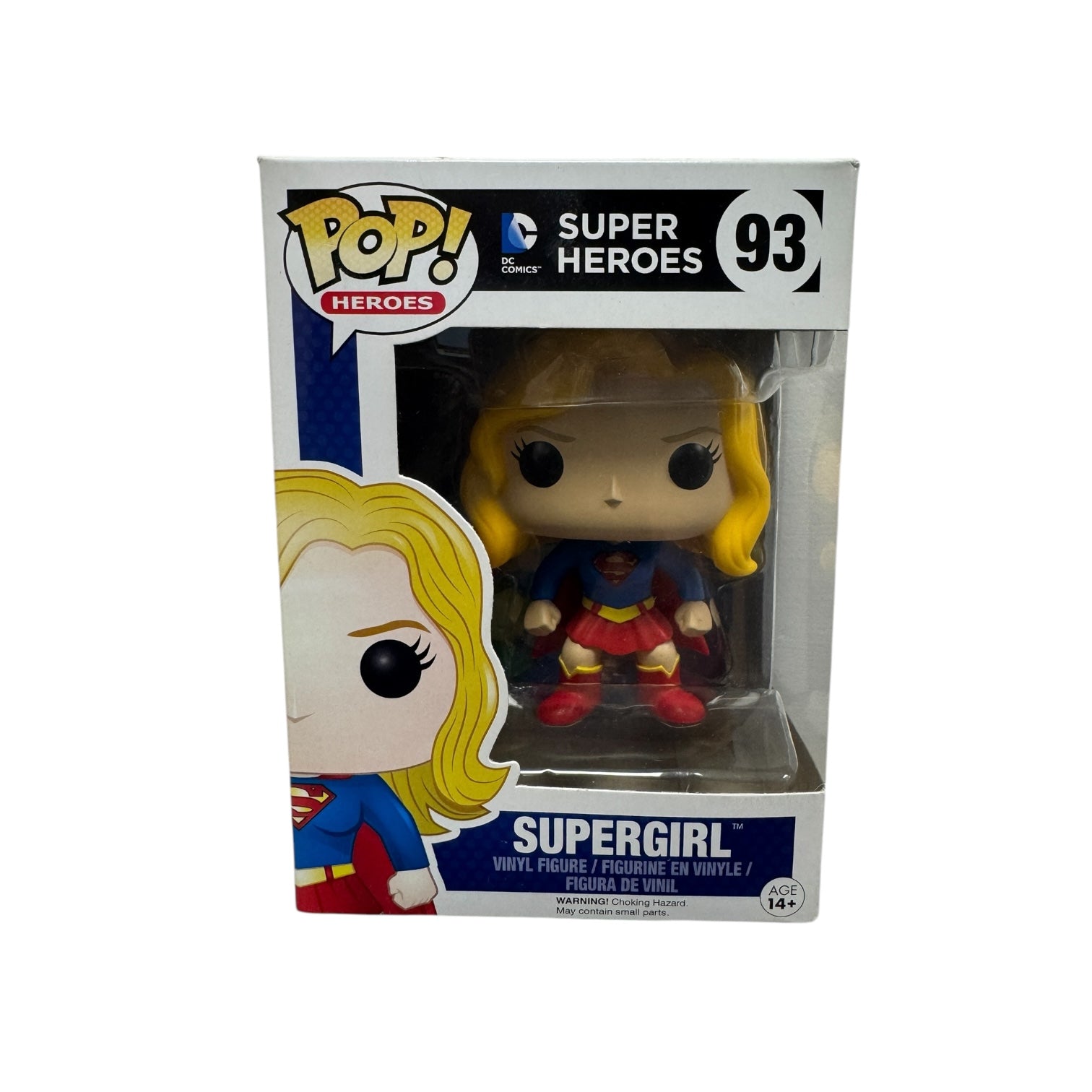 Supergirl wearing her famous blue top, red skirt, red boots with the 'S' logo printed on the front.