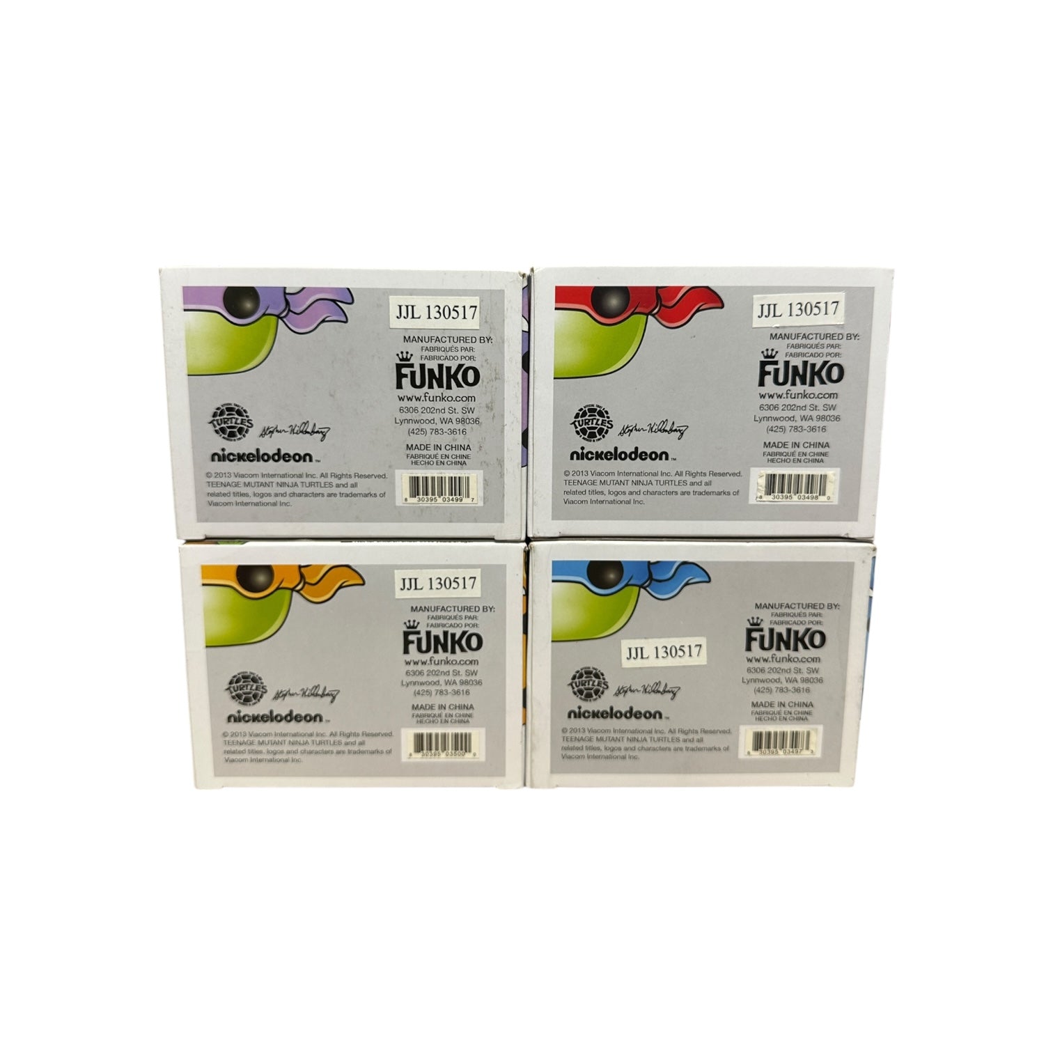 Four Funko boxes with colorful designs on a white background