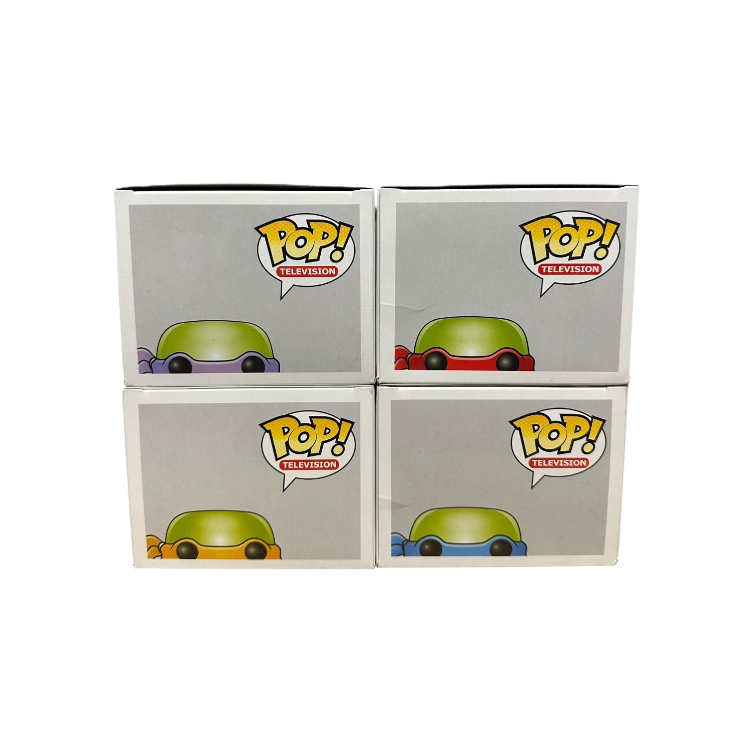 Four Funko Pop! Television boxes with green characters on a white background