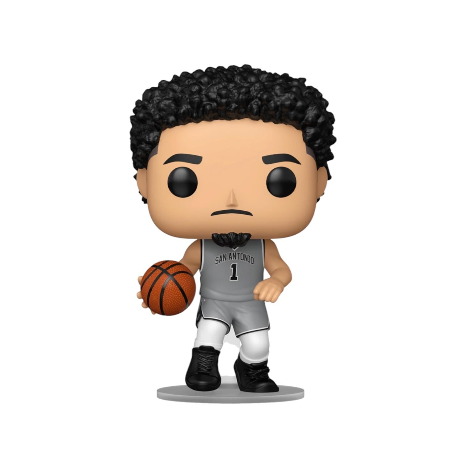 Figurine of a basketball player holding a ball on a white background