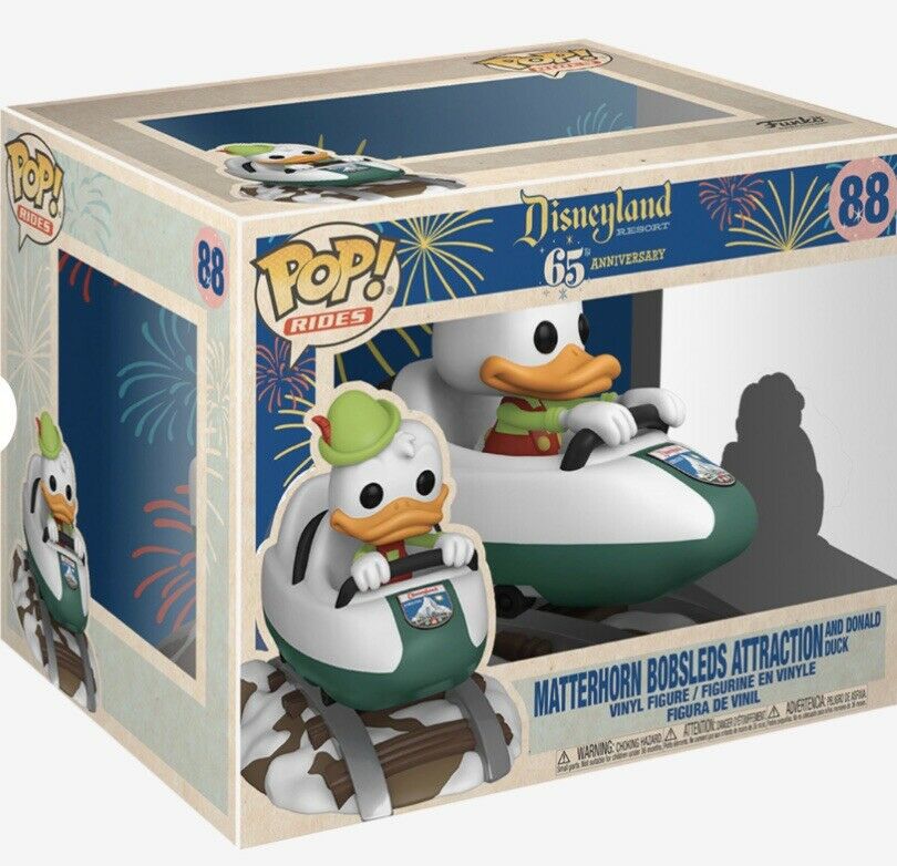 Matterhorn Bobsled attraction with Donald Duck #88 Deluxe Funko Pop celebrating Disneyland's 65th anniversary.