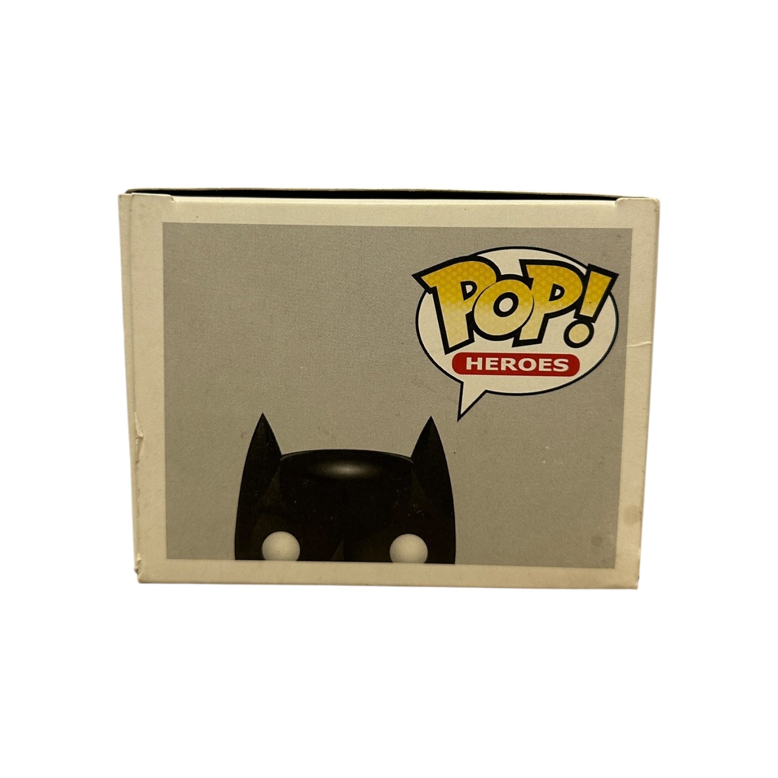 Pop! Heroes cardboard box with a superhero silhouette on a white background