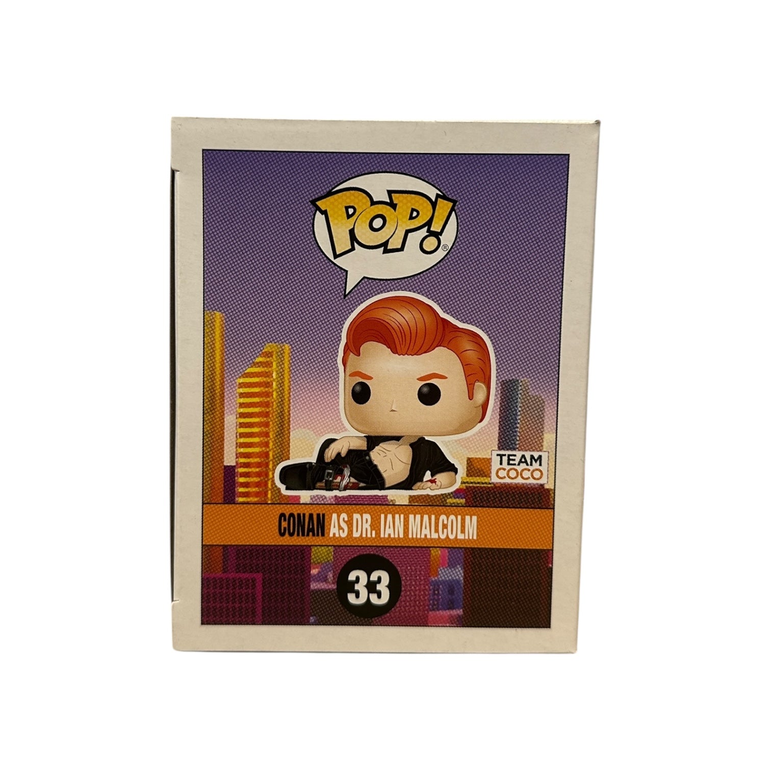 Pop! vinyl figure packaging with character illustration and 'Team Coco' branding.
