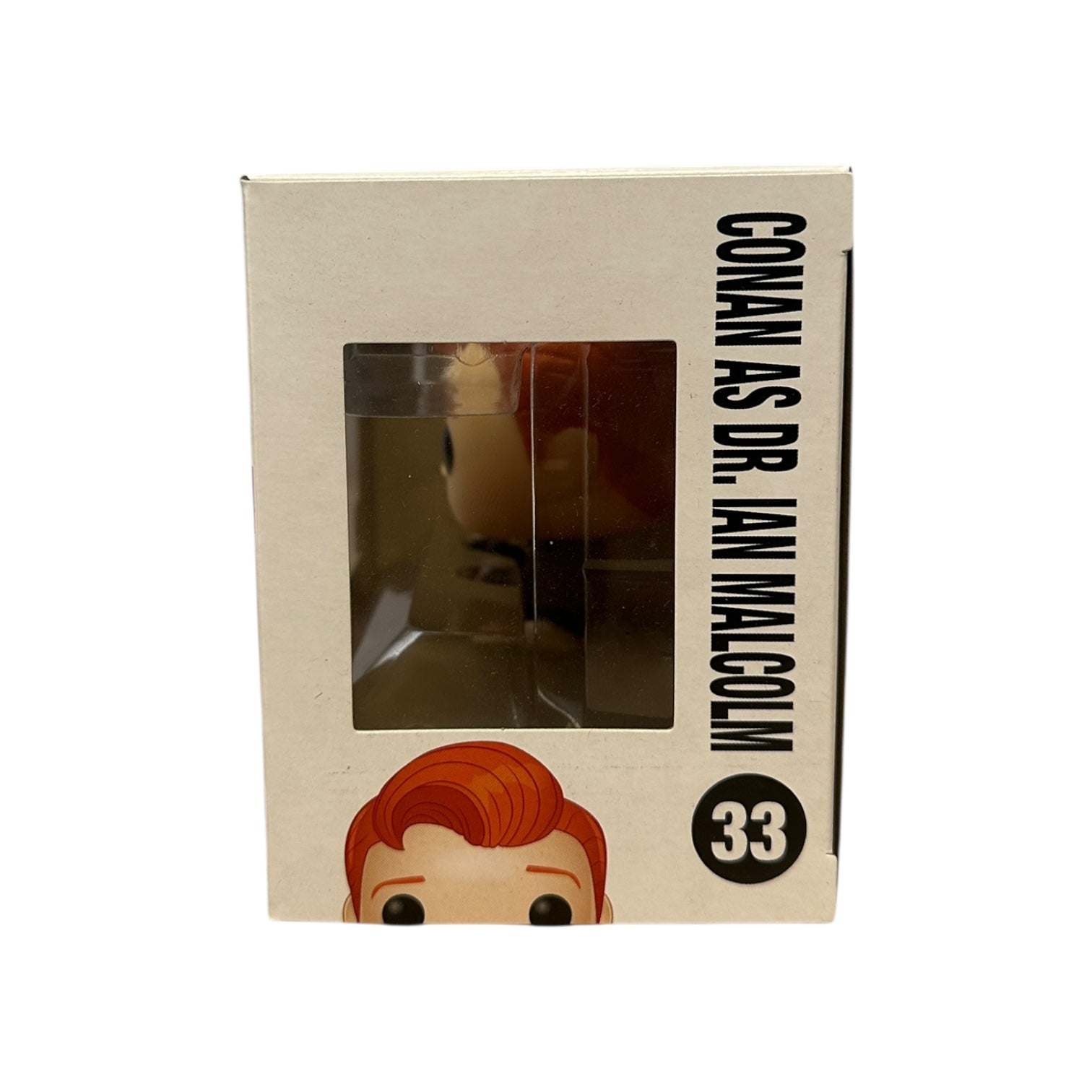Box packaging for a figurine of a character named Dr. Ian Malcolm, with a clear window to show the product inside.