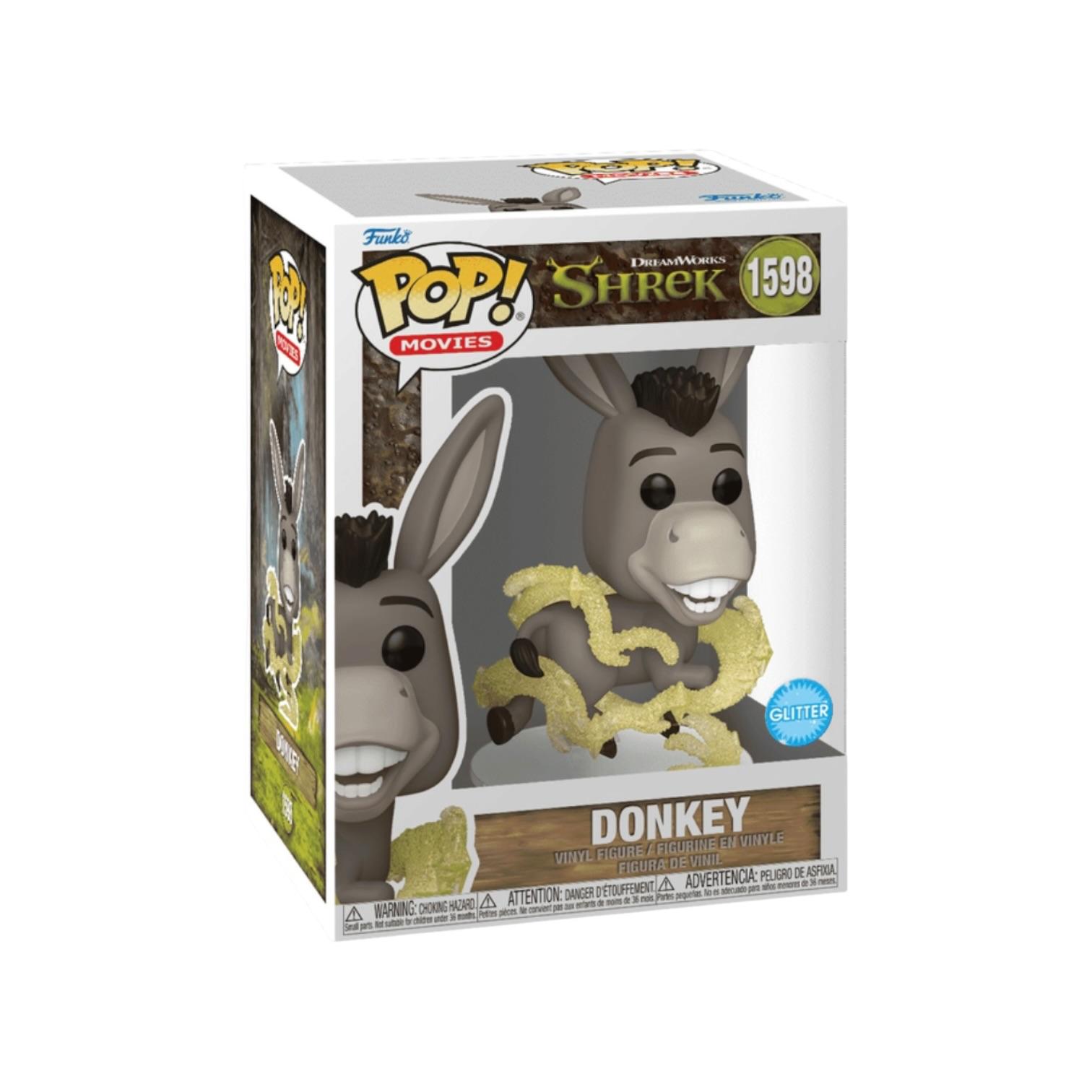 Funko Pop! Movies Disney Shrek Donkey vinyl figure in its original window box packaging, featuring the character holding cheese with a blue Cotopaxi edition sticker.