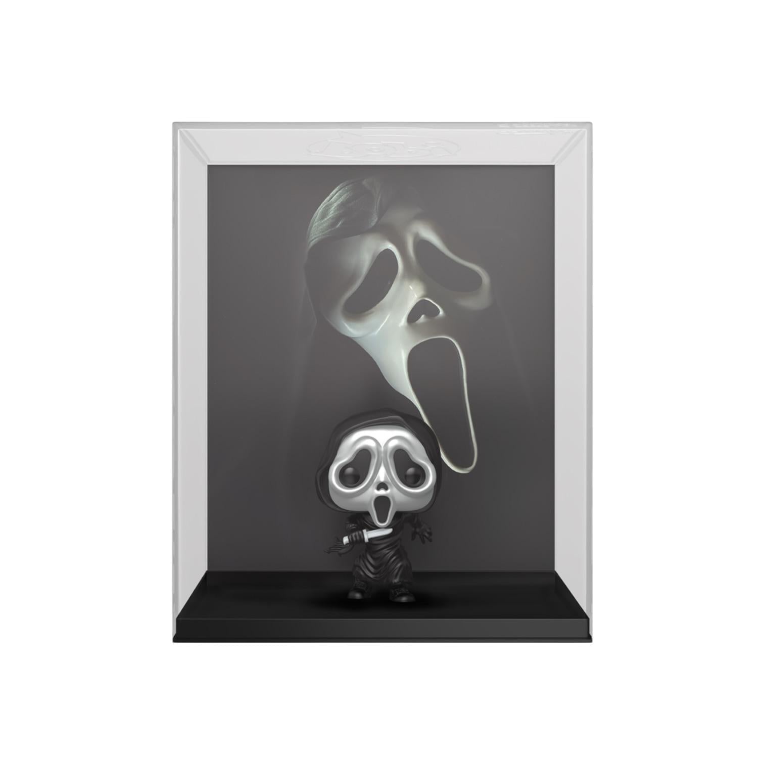 Framed toy figure of a character with a mask on a black background
