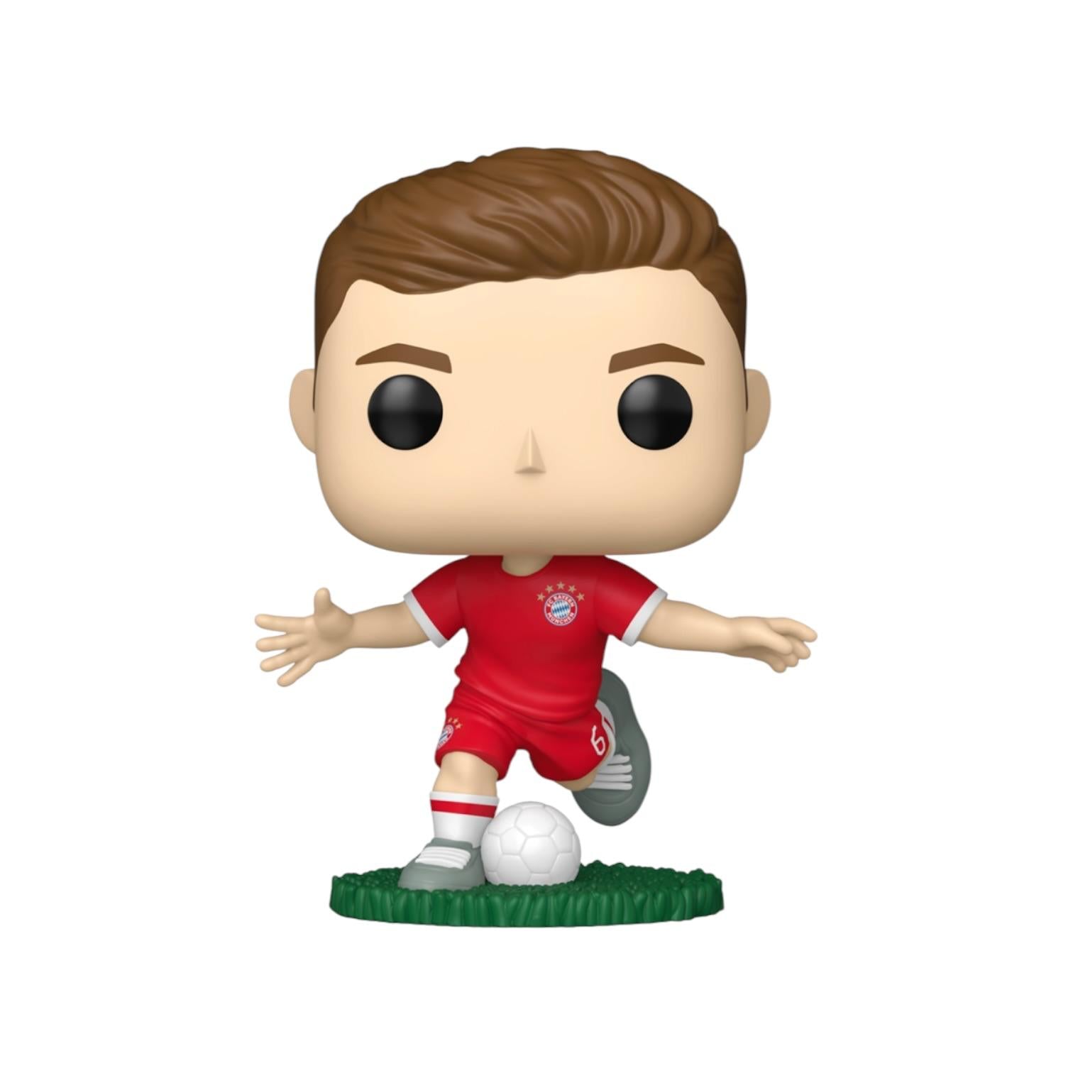 Figurine of a soccer player in a red uniform with a ball on a white background