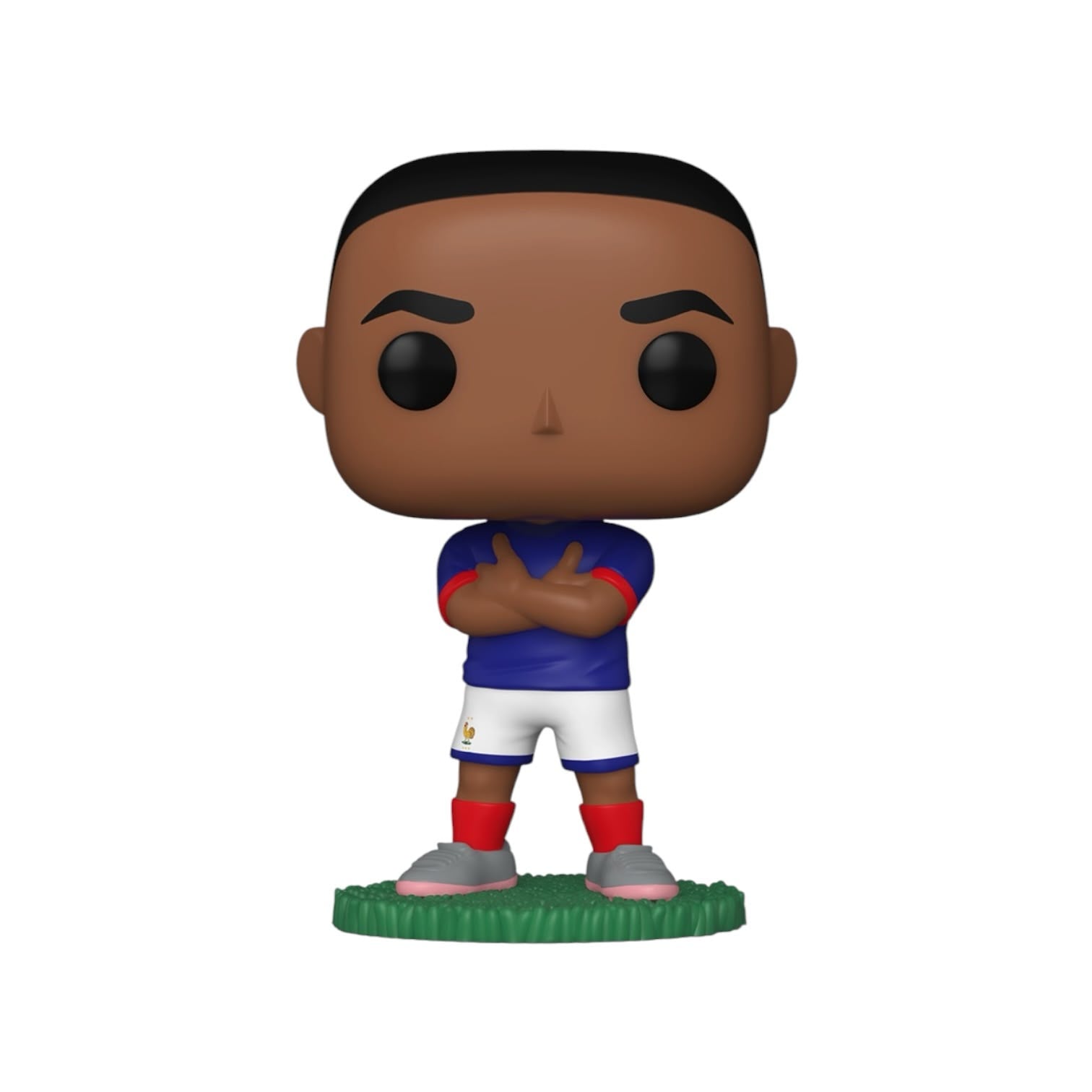 Figurine of a soccer player in a blue jersey with arms crossed on a white background