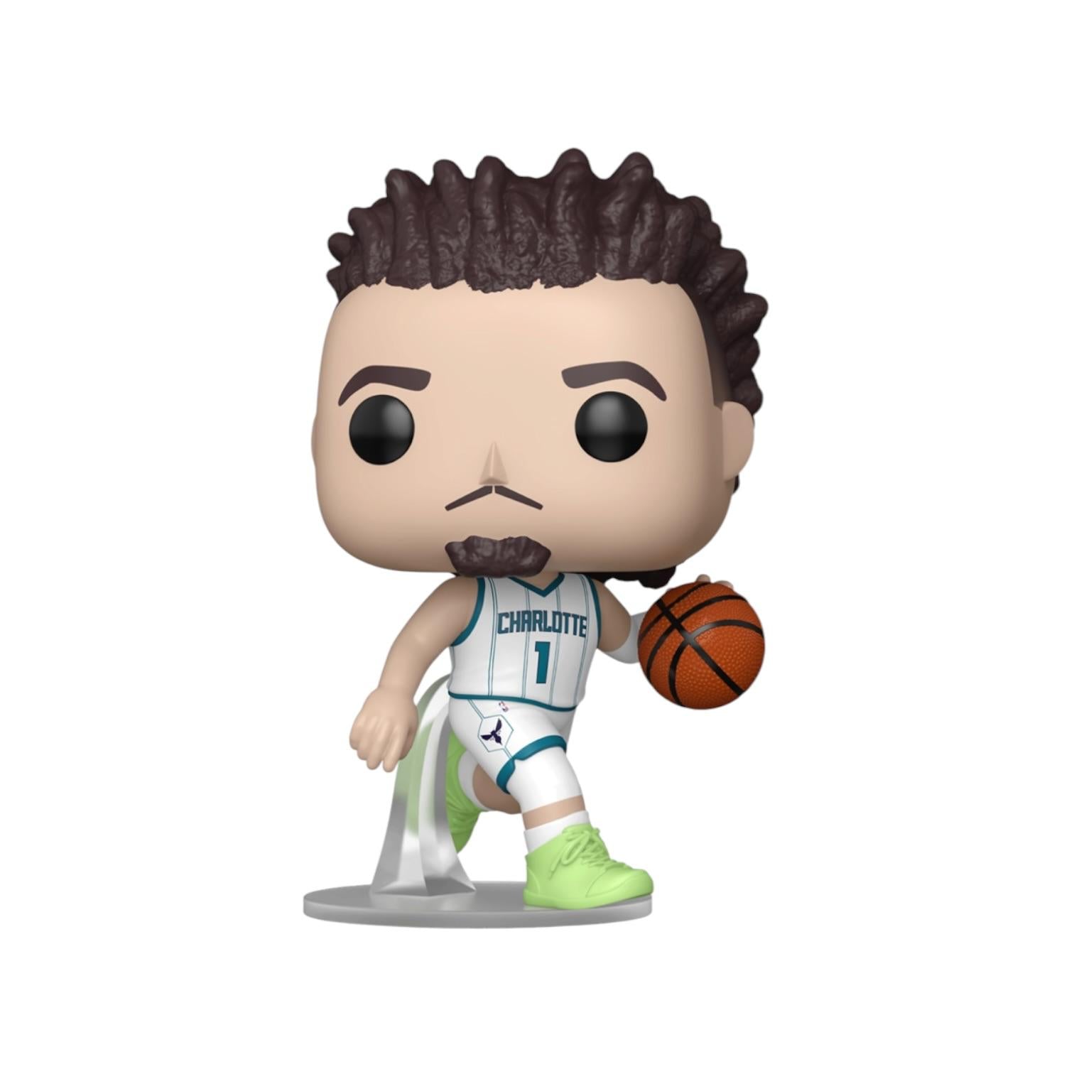 Basketball player figurine with a basketball on a white background