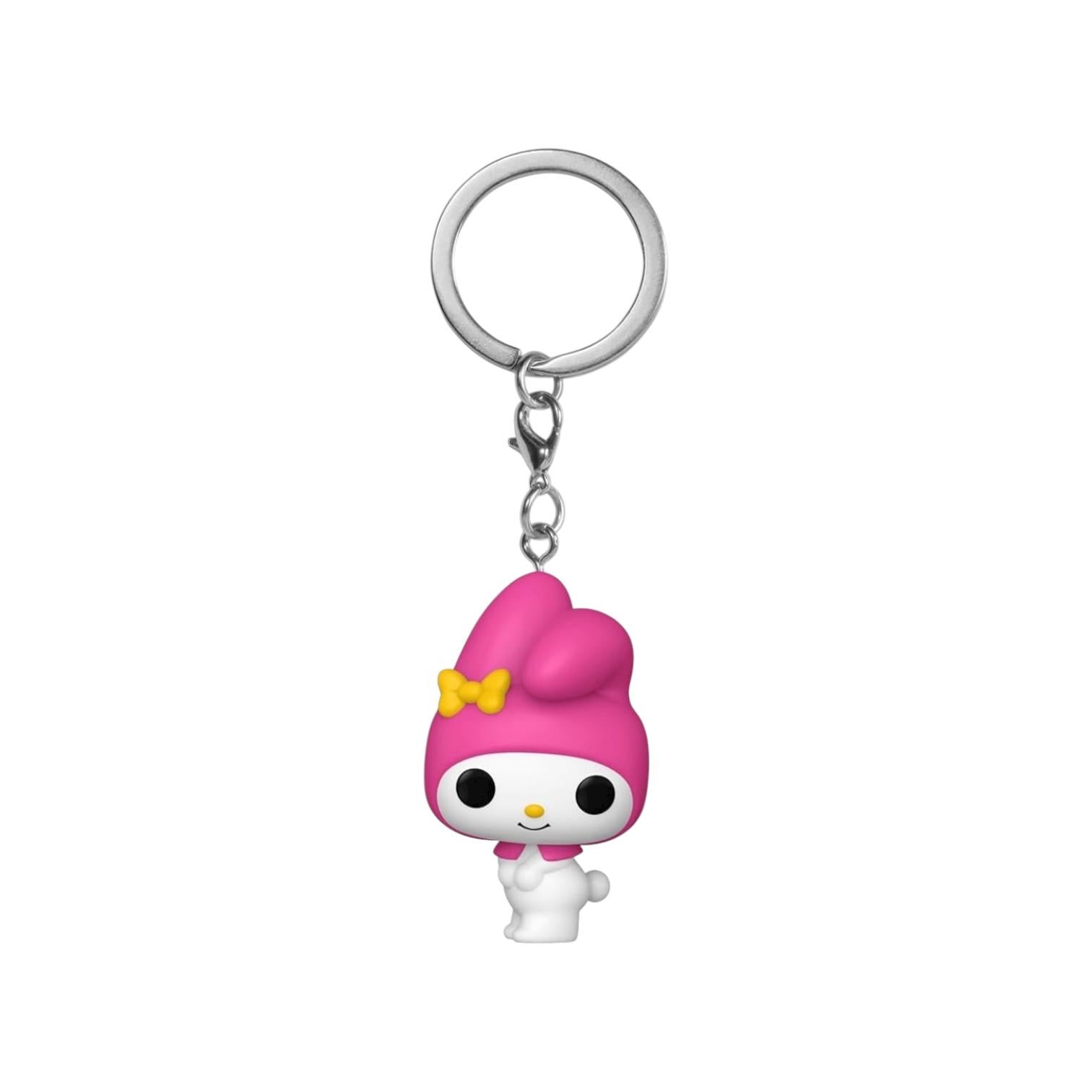 Keychain with a cartoon character wearing a pink outfit and yellow bow on a white background