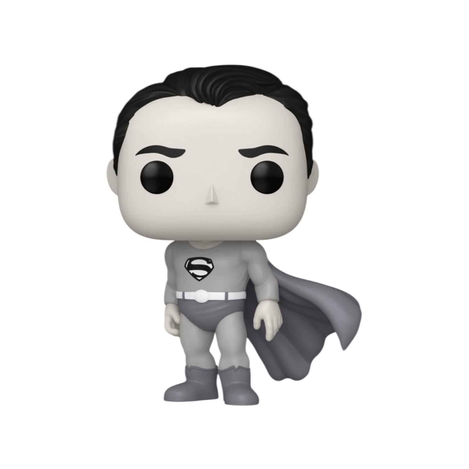 Superman figurine with gray suit and cape on a white background