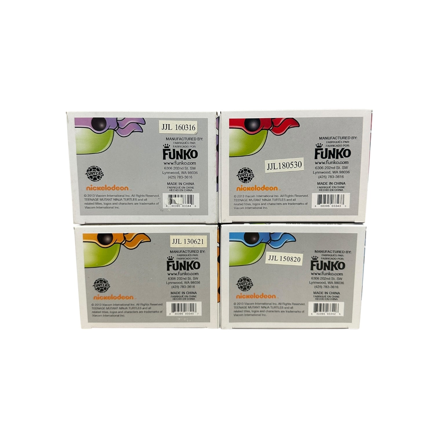 Four Funko product boxes with colorful designs on a white background